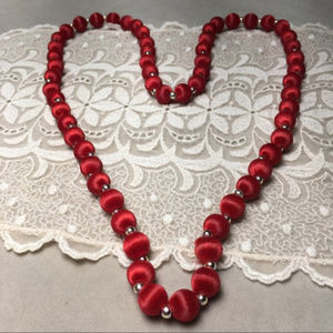 Vintage red satiny thread beaded necklace
